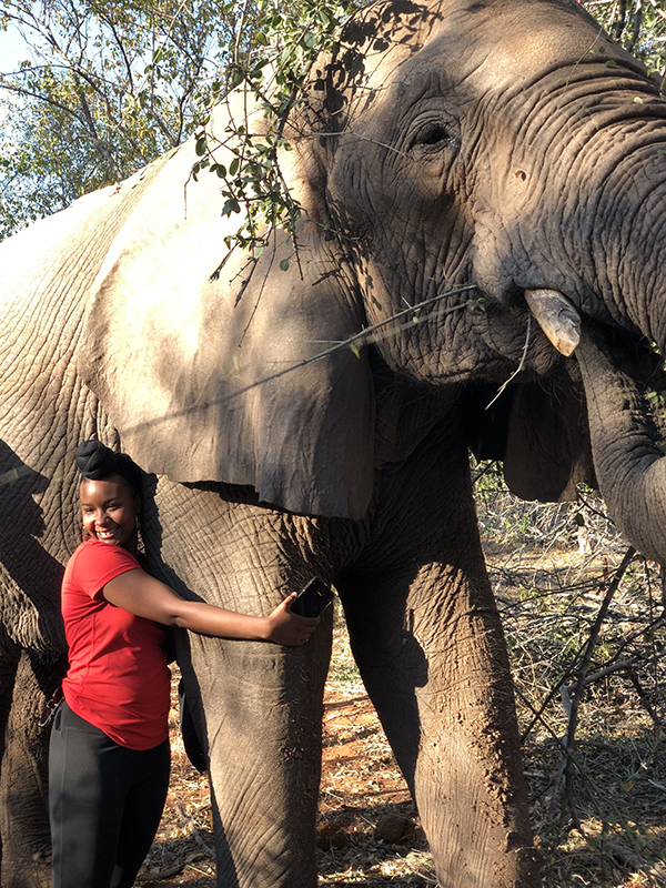 Katera Powell hugging an elephant