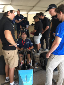 UGA Motorsports participants working in a group.